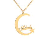 A gold-plated crescent moon and star pendant necklace with engraved letters in the center.
