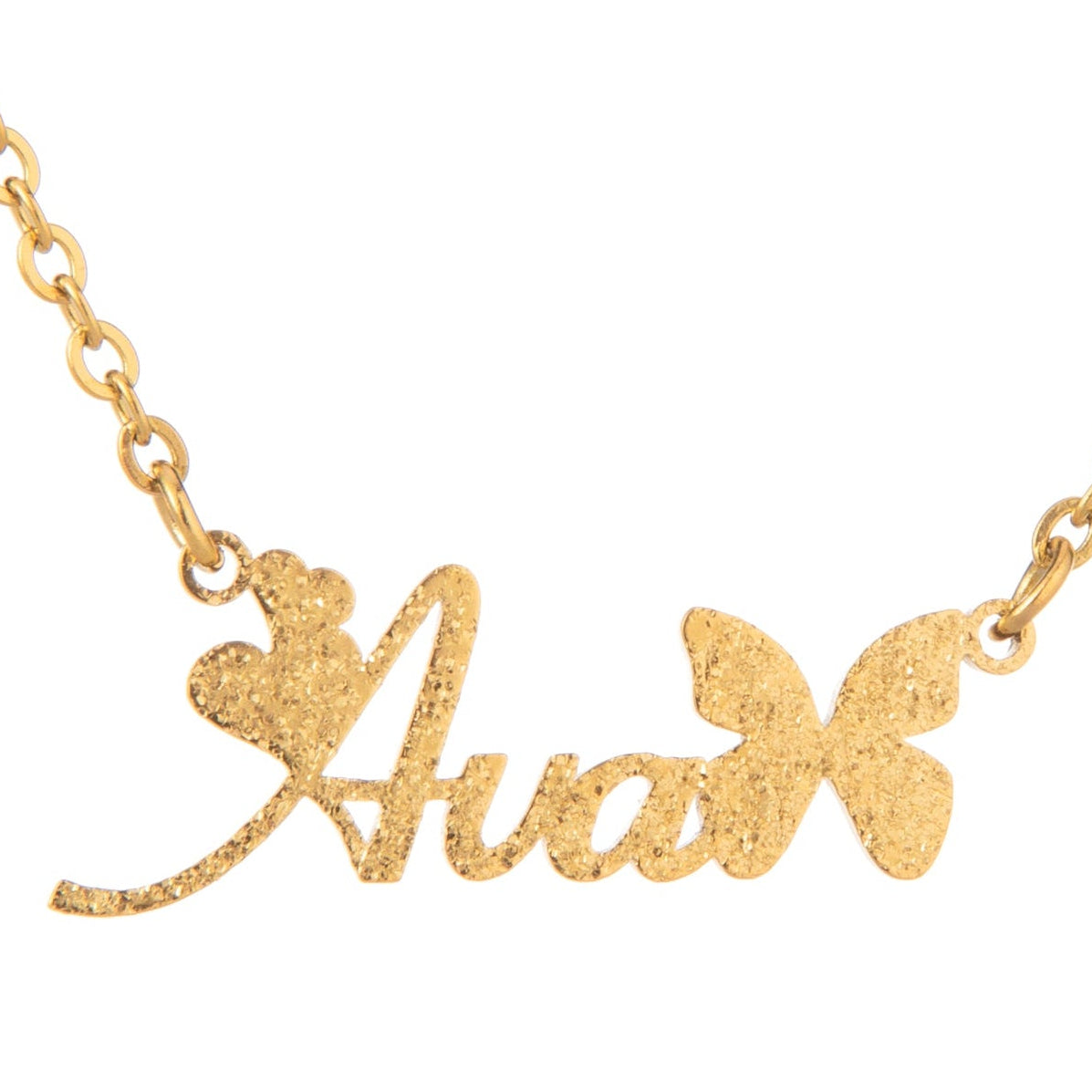 A gold-plated necklace with a personalised name written in a butterfly-style font with heart accents, accompanied by a glitter effect.