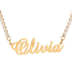 Gold 'Olivia' necklace with diamond-studded chain on a white background
