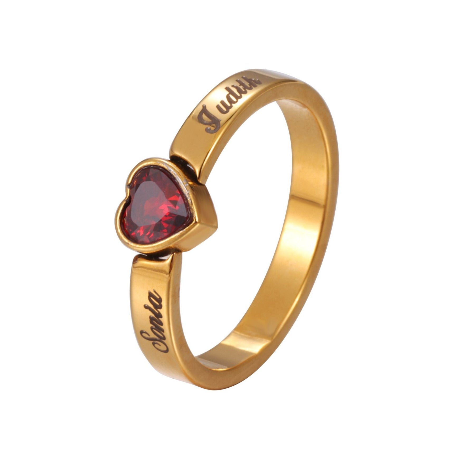 Gold ring with a red heart-shaped gemstone on a white background