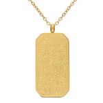 A gold-colored rectangular pendant necklace with a solid pattern made of Coran writtings and a chain link.